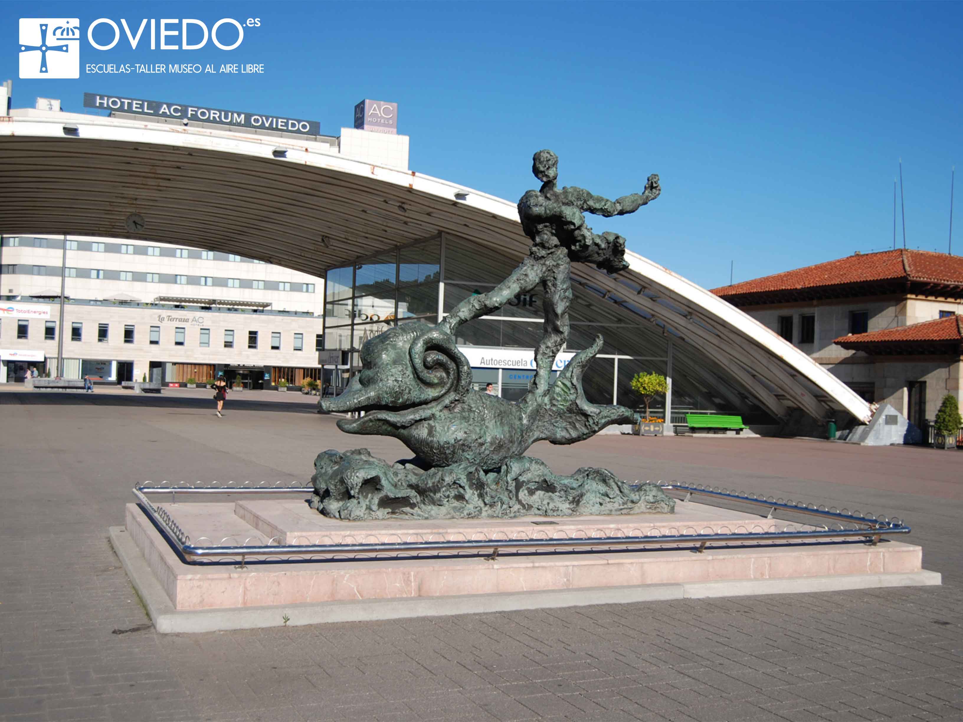 Escultura Hombre sobre Delfín